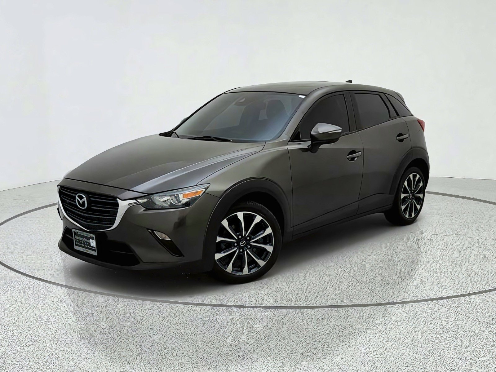 Used 2019 Titanium Flash Mica Mazda Touring image 1