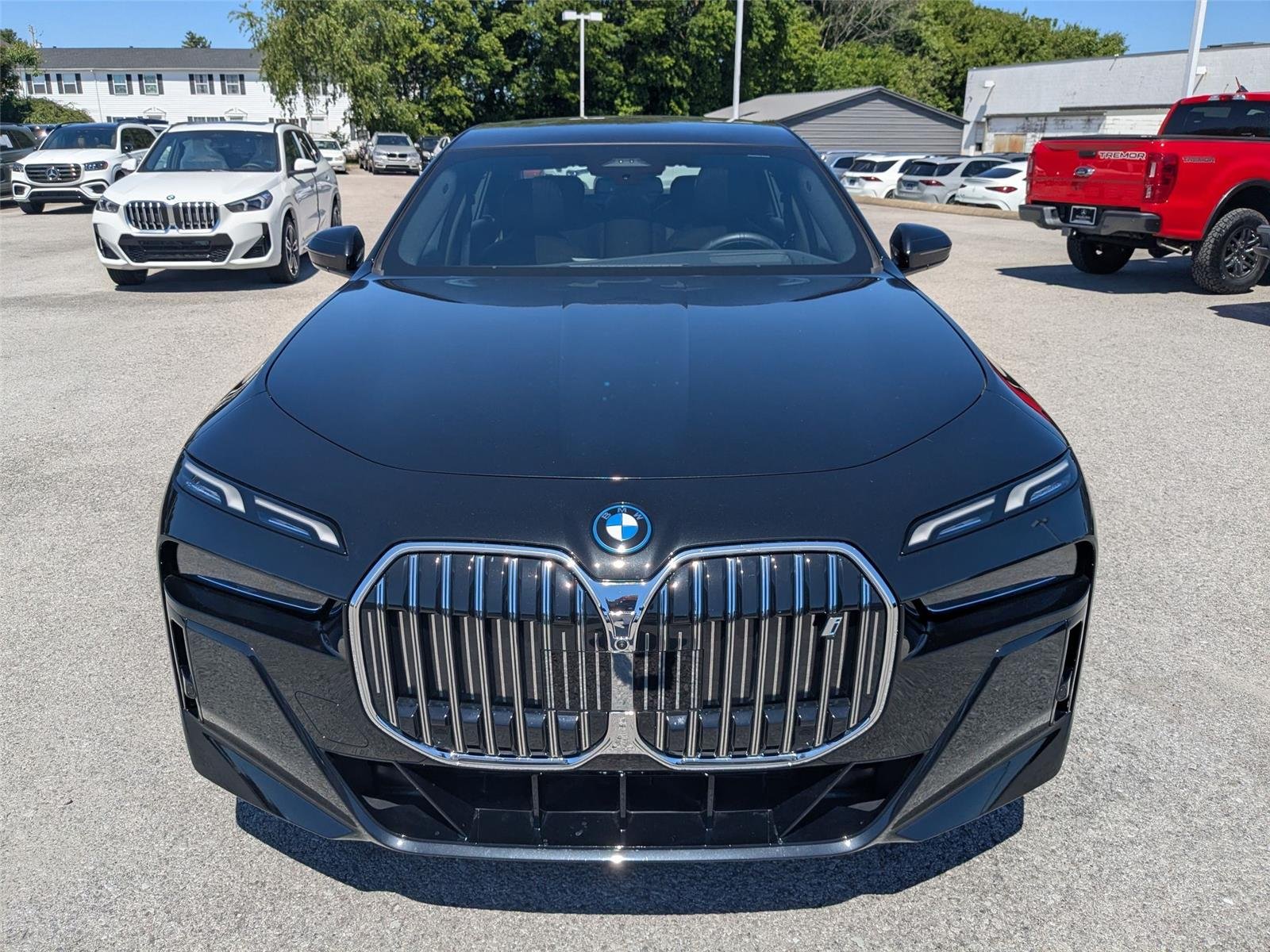 Used 2025 Black Sapphire Metallic BMW eDrive50 image 2