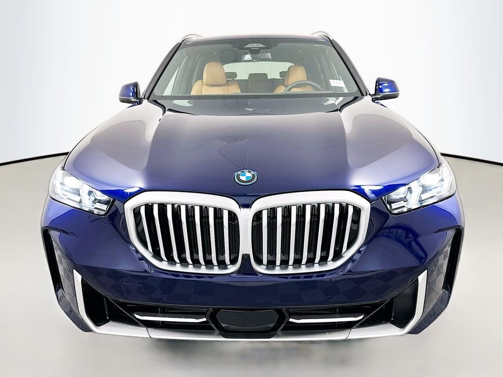 New 2026 Tanzanite Blue II Metallic BMW xDrive50e image 2