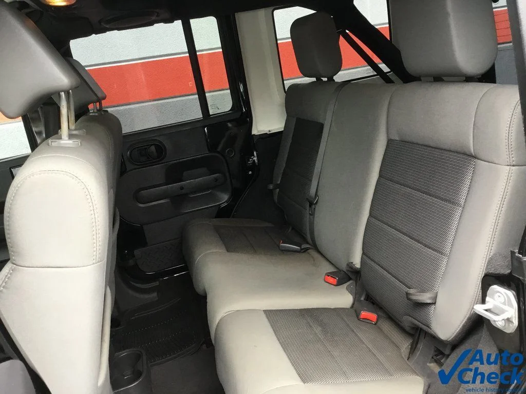 Used 2010 Black Jeep Unlimited Sport image 23