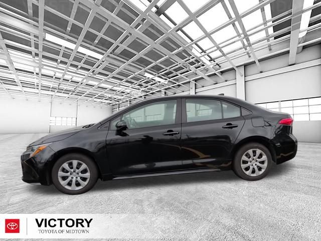 Used 2024 Black Toyota LE image 7