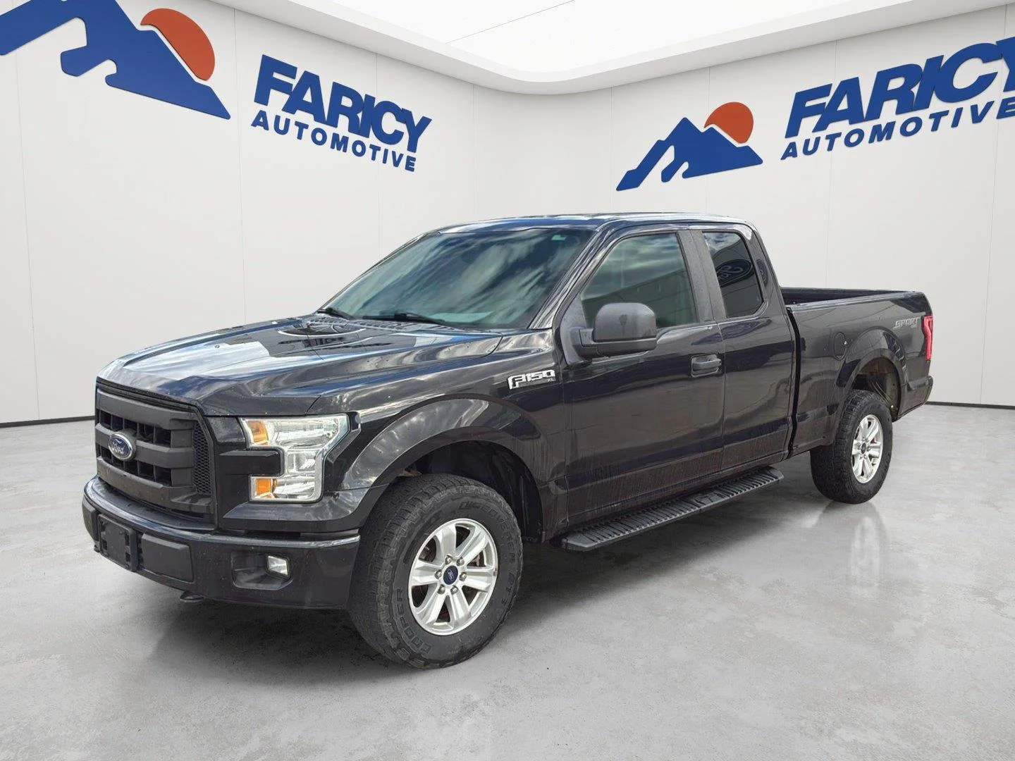 Used 2015 Tuxedo Black Metallic Ford XL image 1