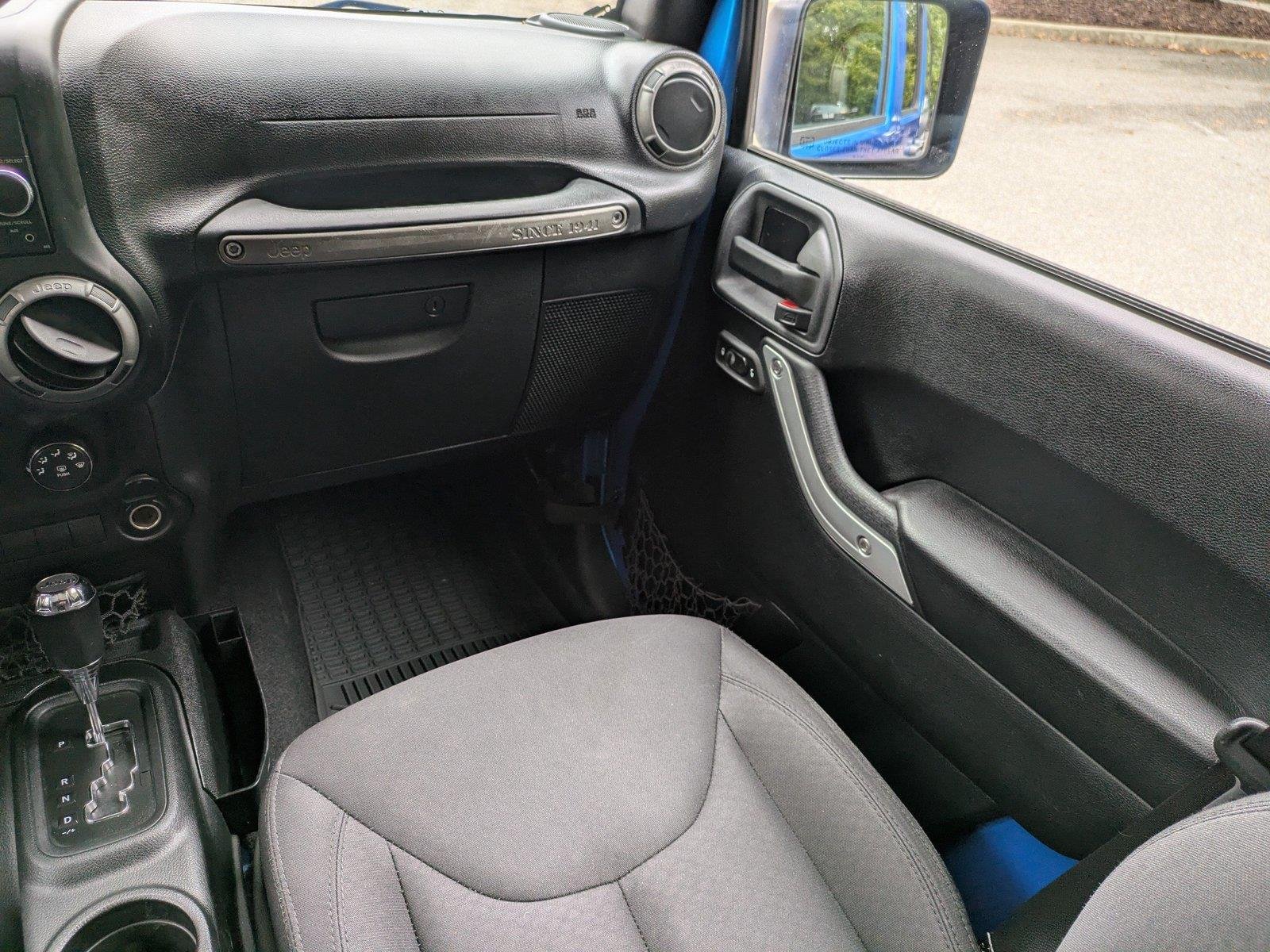 Used 2015 Hydro Blue Pearl Coat Jeep Sport image 17