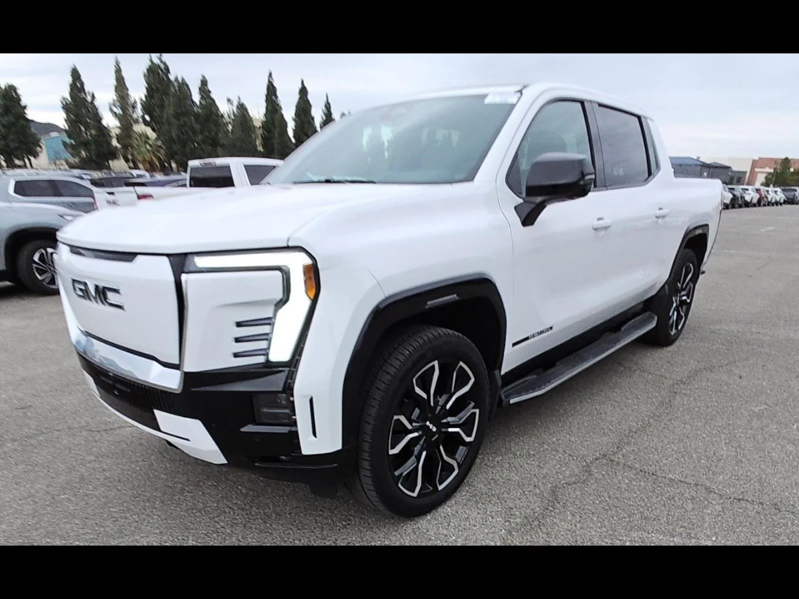 Used 2025 Summit White GMC Extended Range Denali image 1