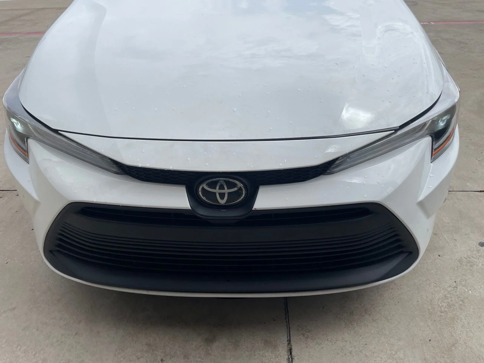Used 2024 White Toyota LE image 2