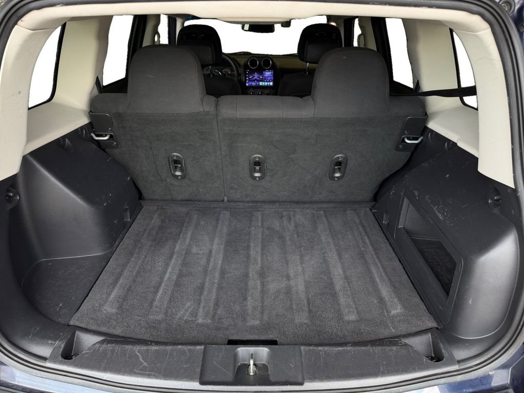 Used 2016 Blue Jeep Sport image 17