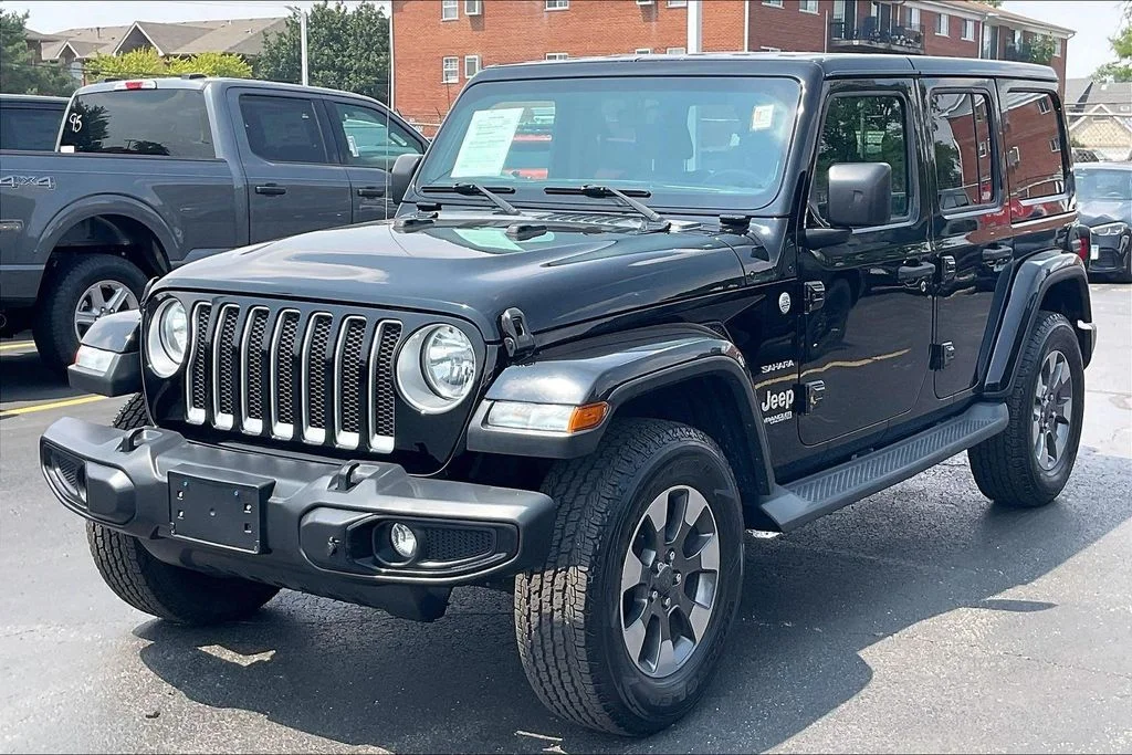 Used 2018 Black Jeep Unlimited Sahara image 10