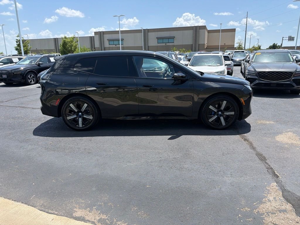 Used 2024 Black BMW xDrive50 image 8