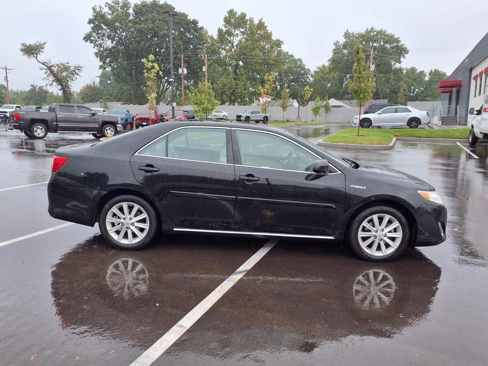 Used 2014 Toyota Camry XLE Hybrid with VIN 4T1BD1FK7EU110194 for sale in Kirkwood, MO
