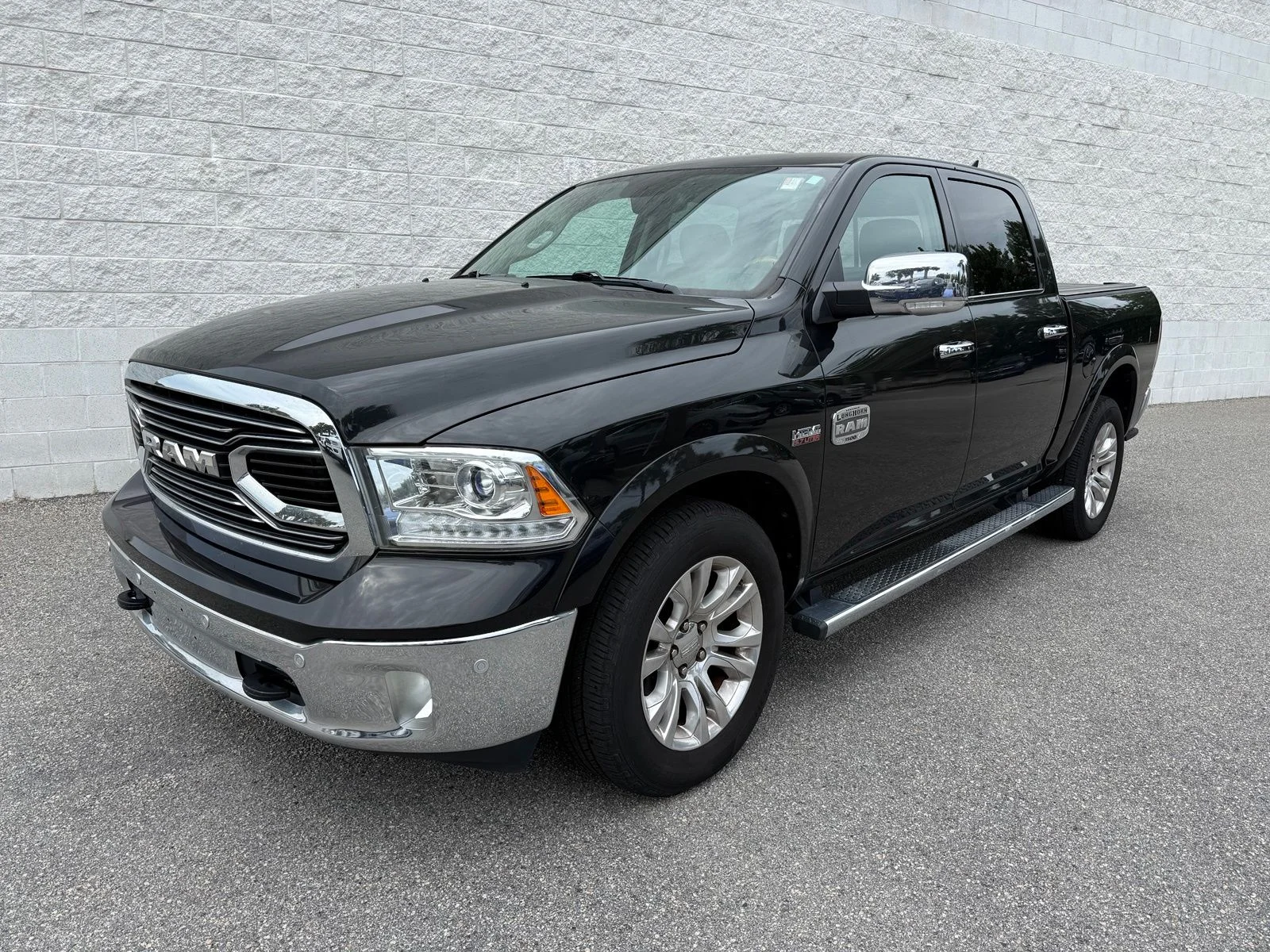 Used 2017 Brilliant Black Crystal Pearlcoat Ram Laramie Longhorn image 1
