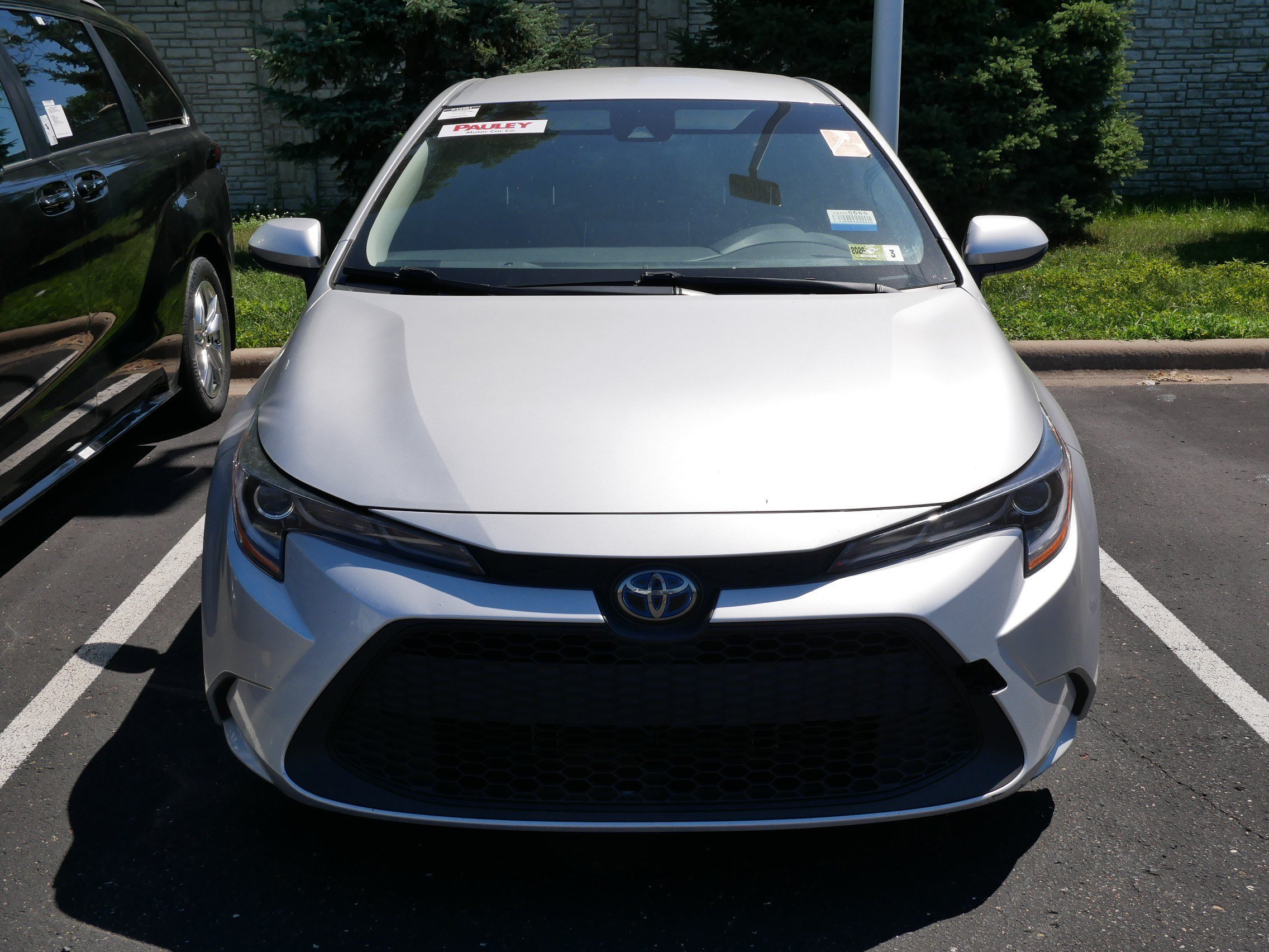 Certified 2021 Toyota Corolla LE with VIN JTDEAMDE0MJ029949 for sale in Brooklyn Center, Minnesota