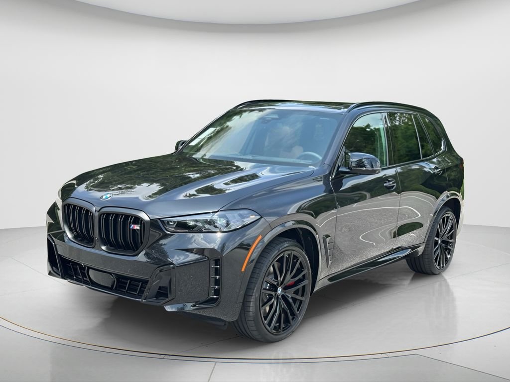New 2026 Black Sapphire Metallic BMW M60i image 1