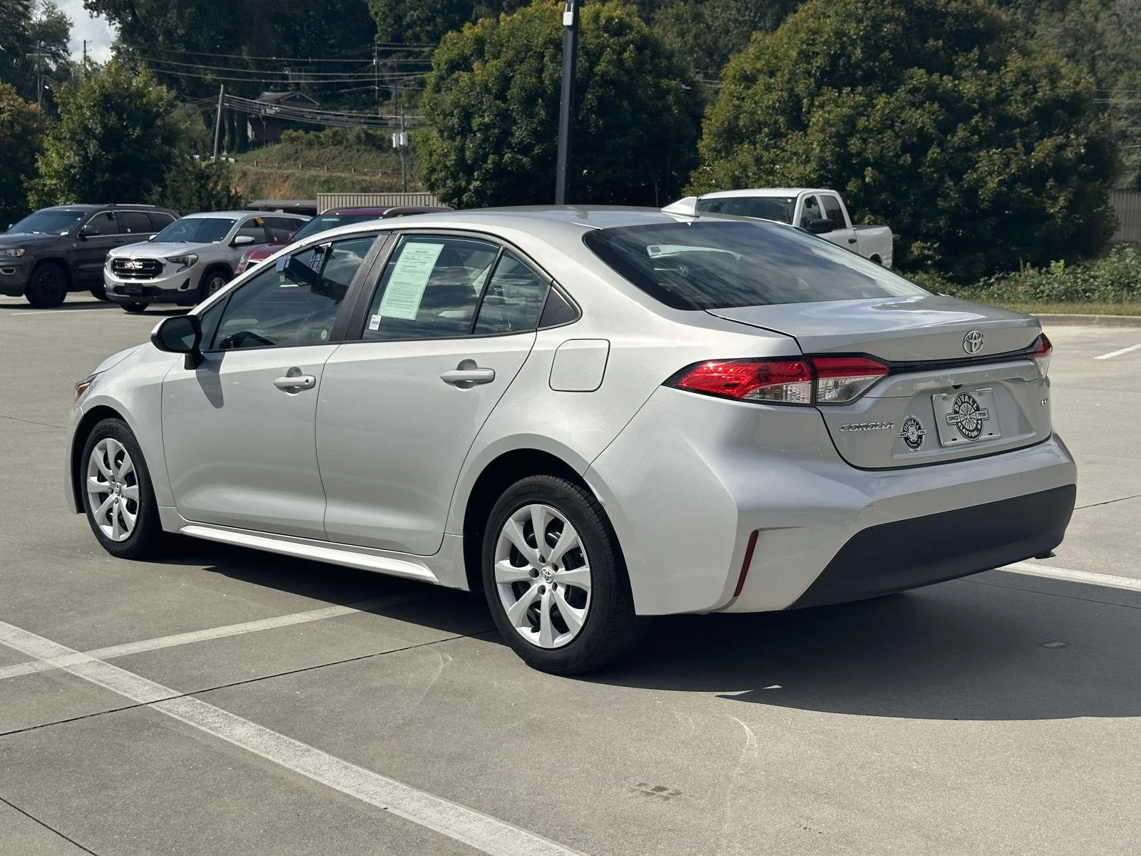 Used 2023 Classic Silver Metallic Toyota LE image 5