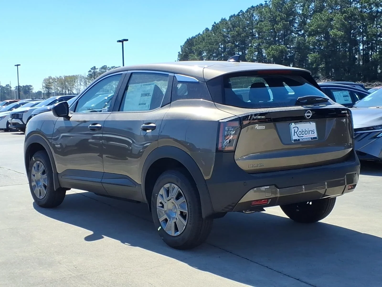2026 Nissan Kicks S Brown at Robbins Nissan