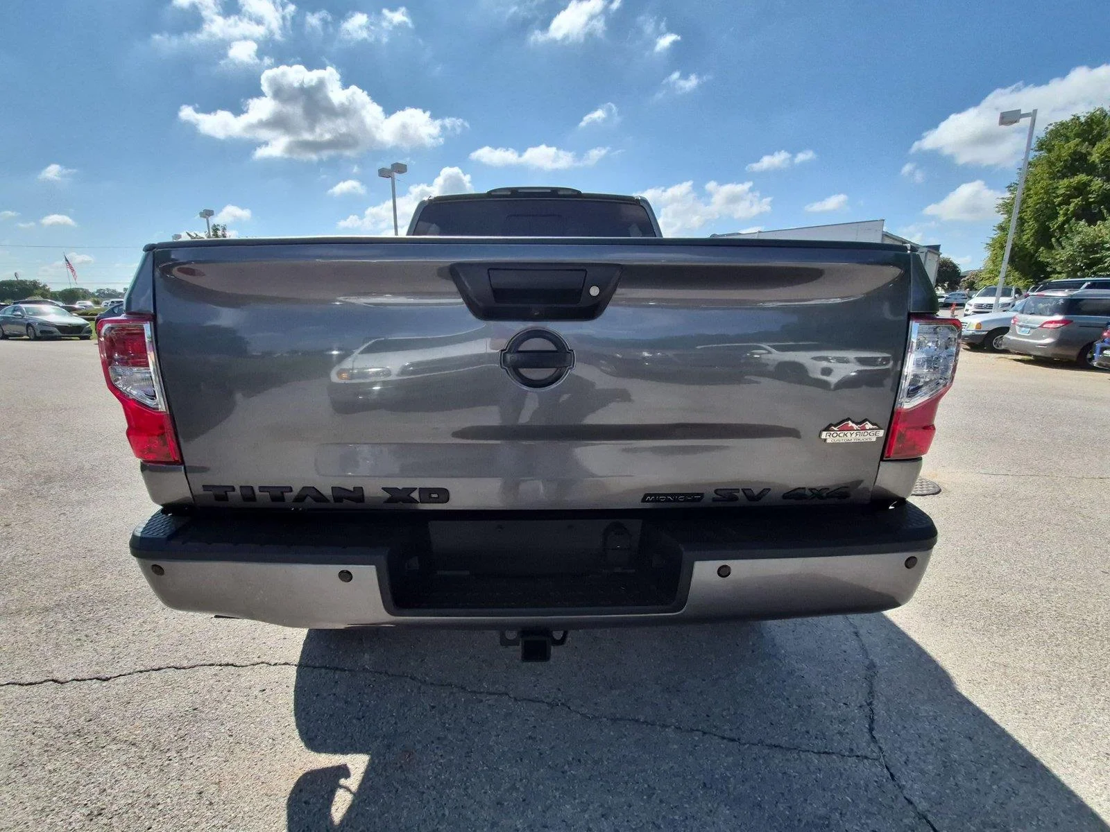 Used 2019 Gun Metallic Nissan SV image 4