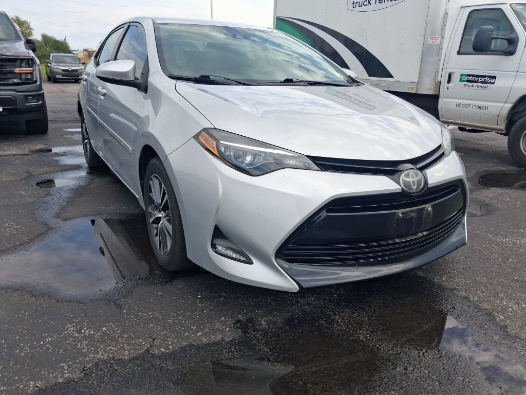 Used 2019 Classic Silver Metallic Toyota LE image 5