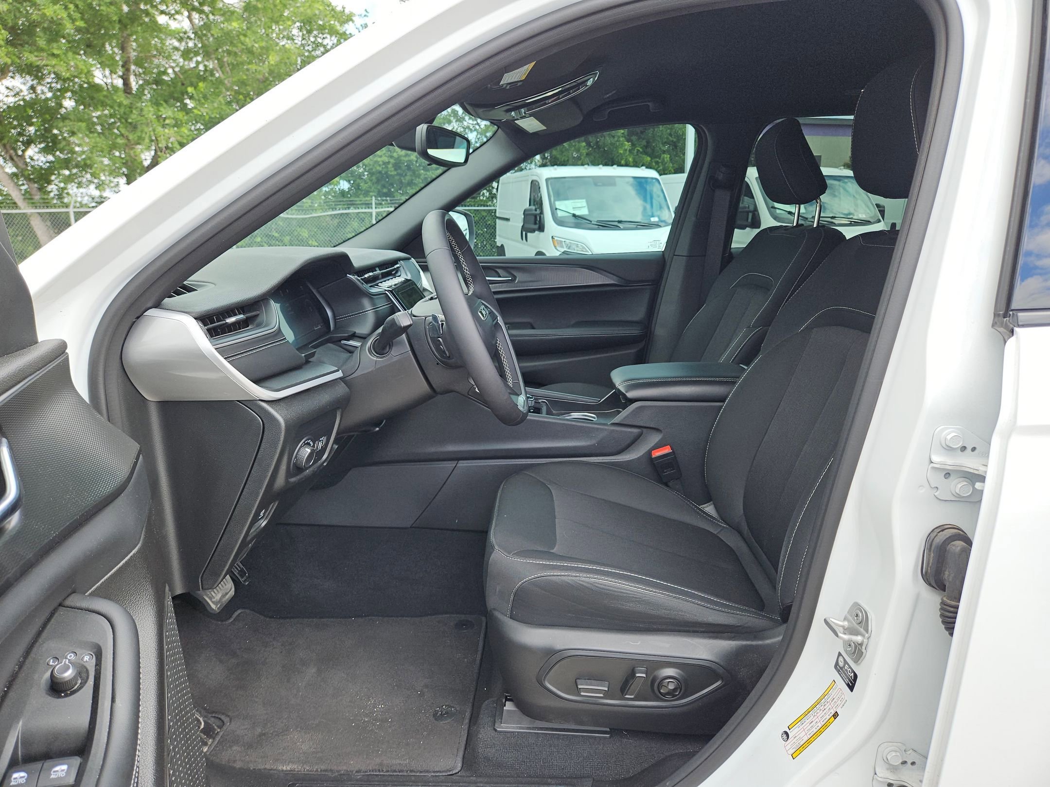 Used 2024 Bright White Clearcoat Jeep Laredo A image 9