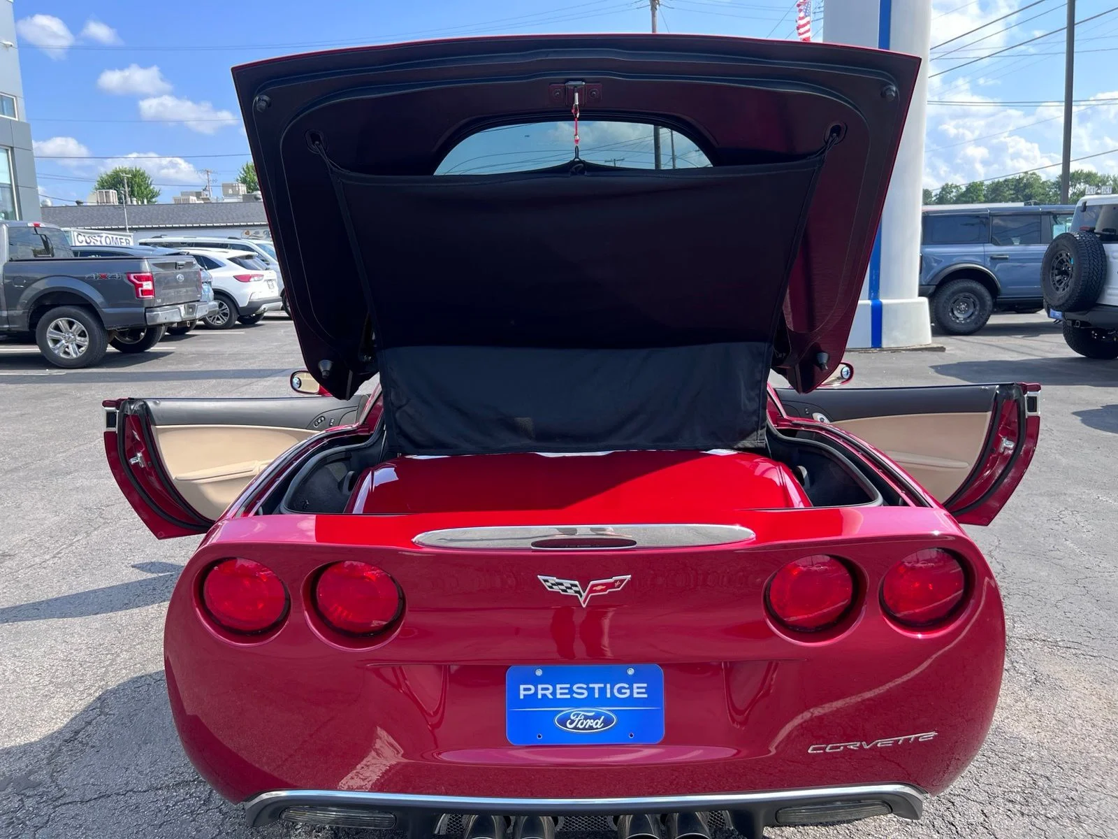 Used 2012 Crystal Red Tintcoat Chevrolet Grand Sport image 50
