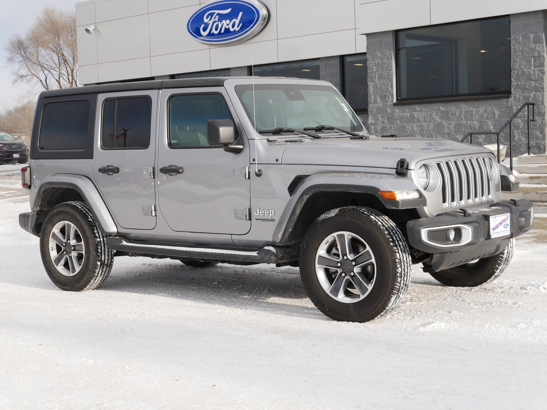 Used 2020 Jeep Wrangler Unlimited Sahara with VIN 1C4HJXEG5LW298674 for sale in Northfield, Minnesota