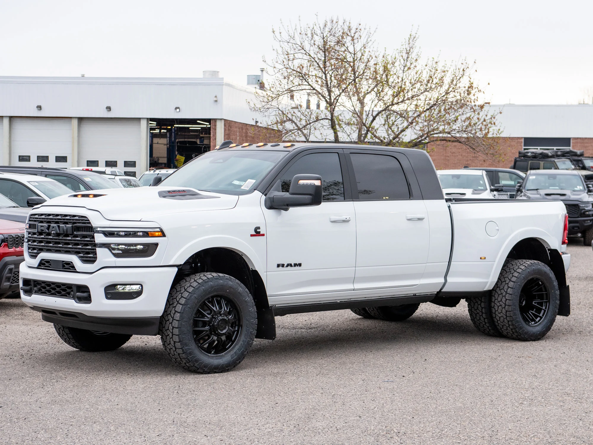New 2026 White RAM Limited* Mega Cab, 2 Inch Lift, 35 Inch Tires, Fuel Wheels image 4