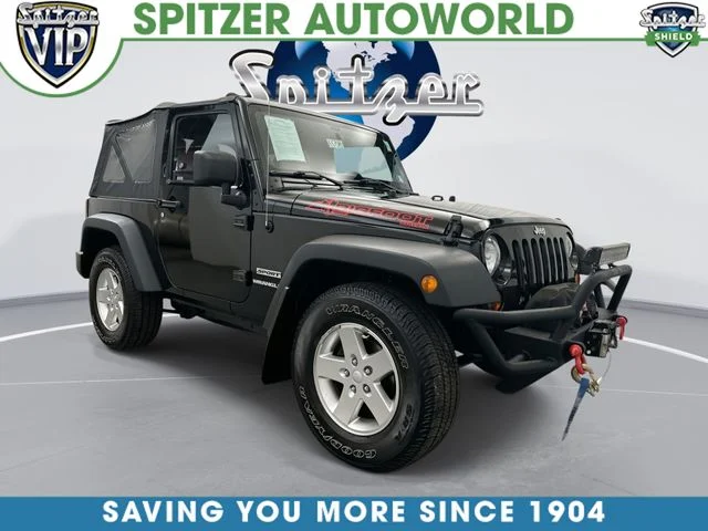 Used 2013 Black Clearcoat Jeep Sport image 1