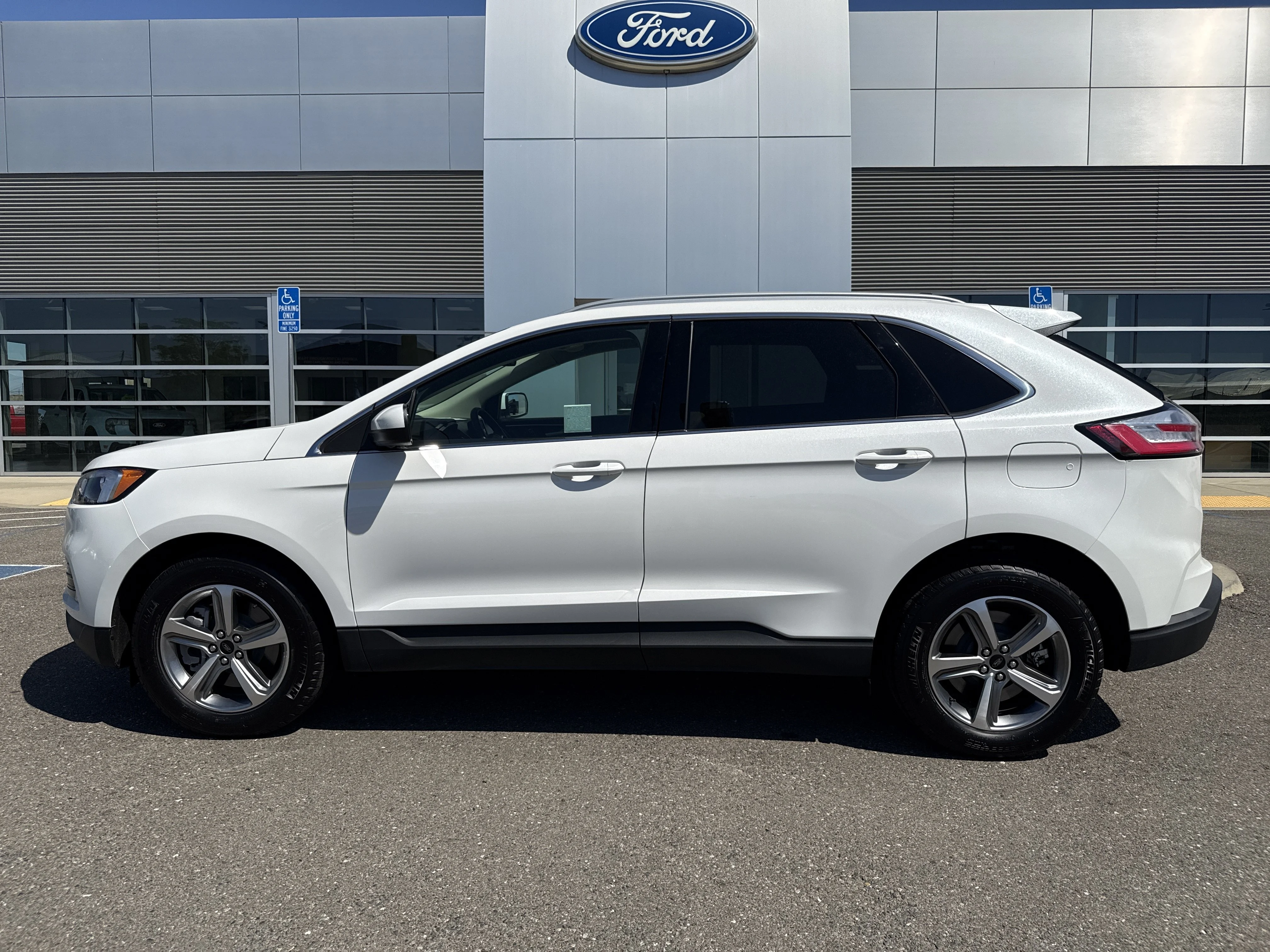 Used 2024 Star White Metallic Tri-Coat Ford SEL image 2