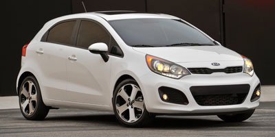 Used 2012 Clear White Kia LX image 1