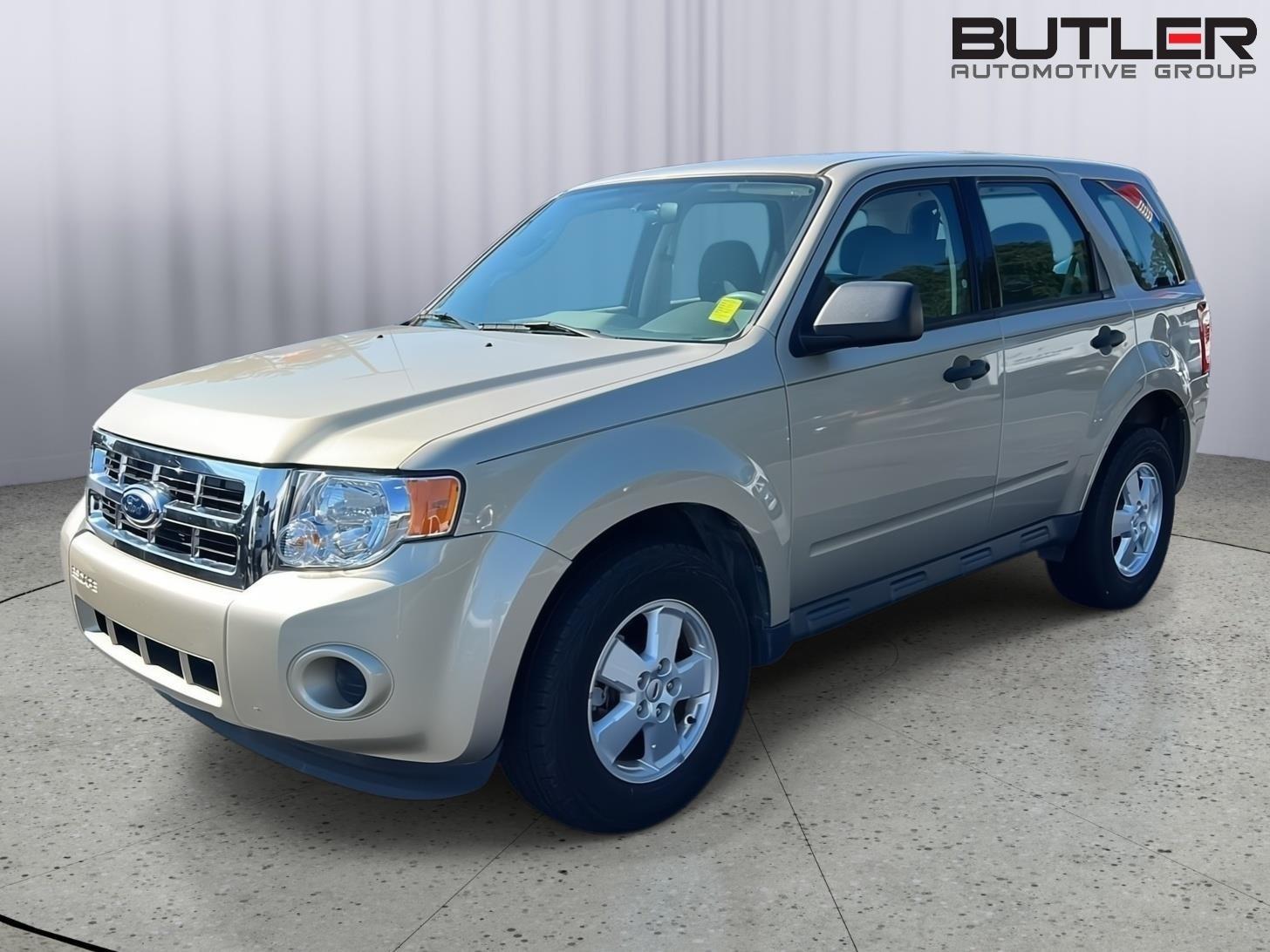 Used 2012 Gold Leaf Metallic Ford XLS image 1