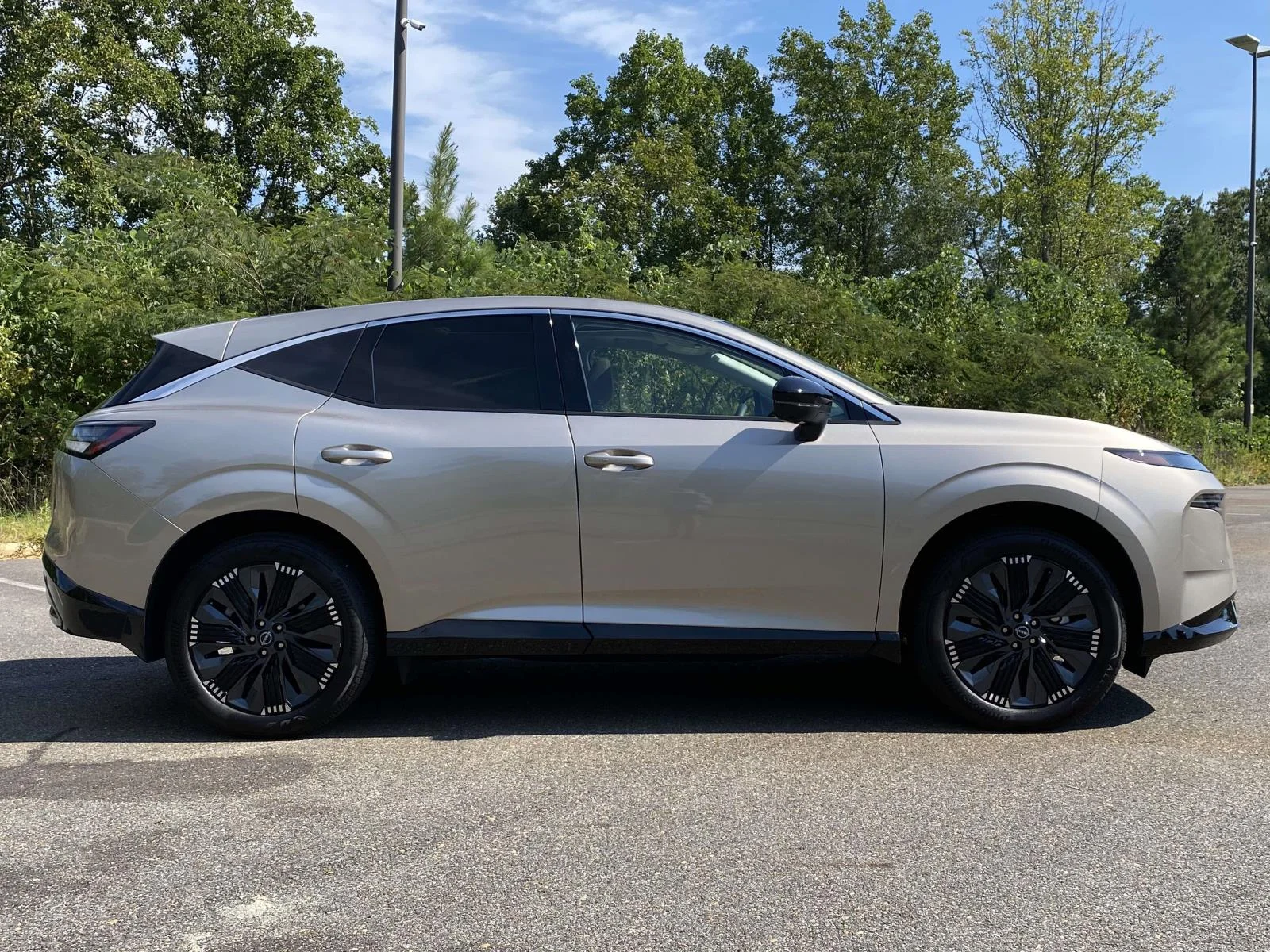 Used 2026 Champagne Silver Metallic Nissan Platinum image 2