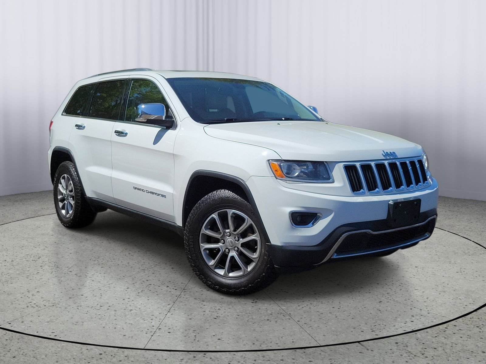 Used 2014 White Jeep Limited image 1