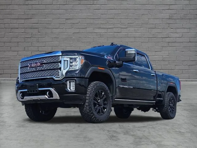 Used 2021 EBONY TWILIGHT METALLIC GMC Denali image 1