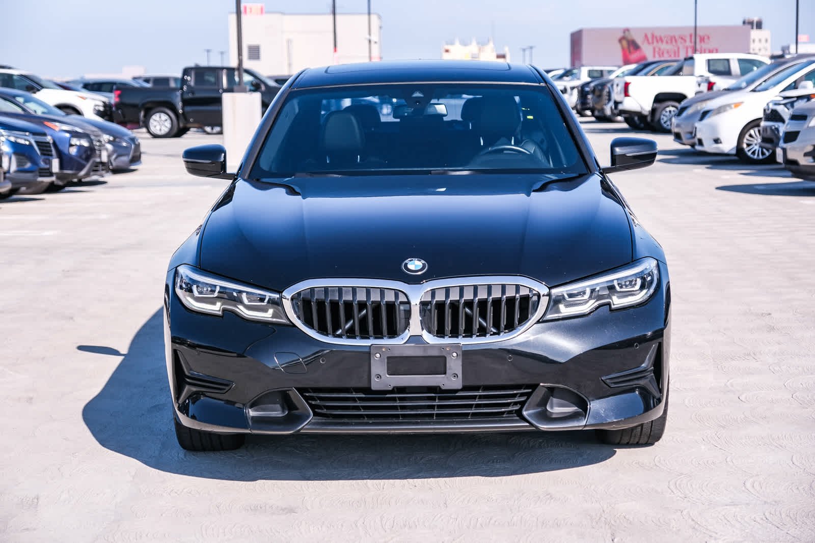 Used 2022 Black Sapphire Metallic BMW 330i image 2