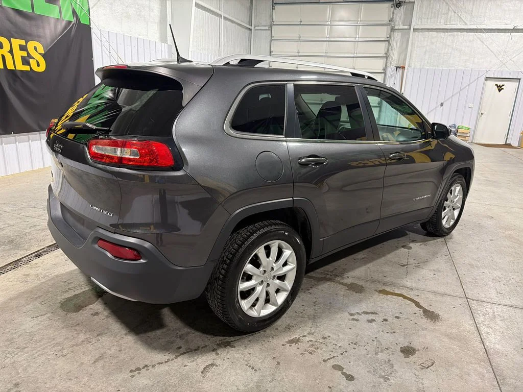 Used 2016 Granite Crystal Metallic Clearcoat Jeep Limited image 6