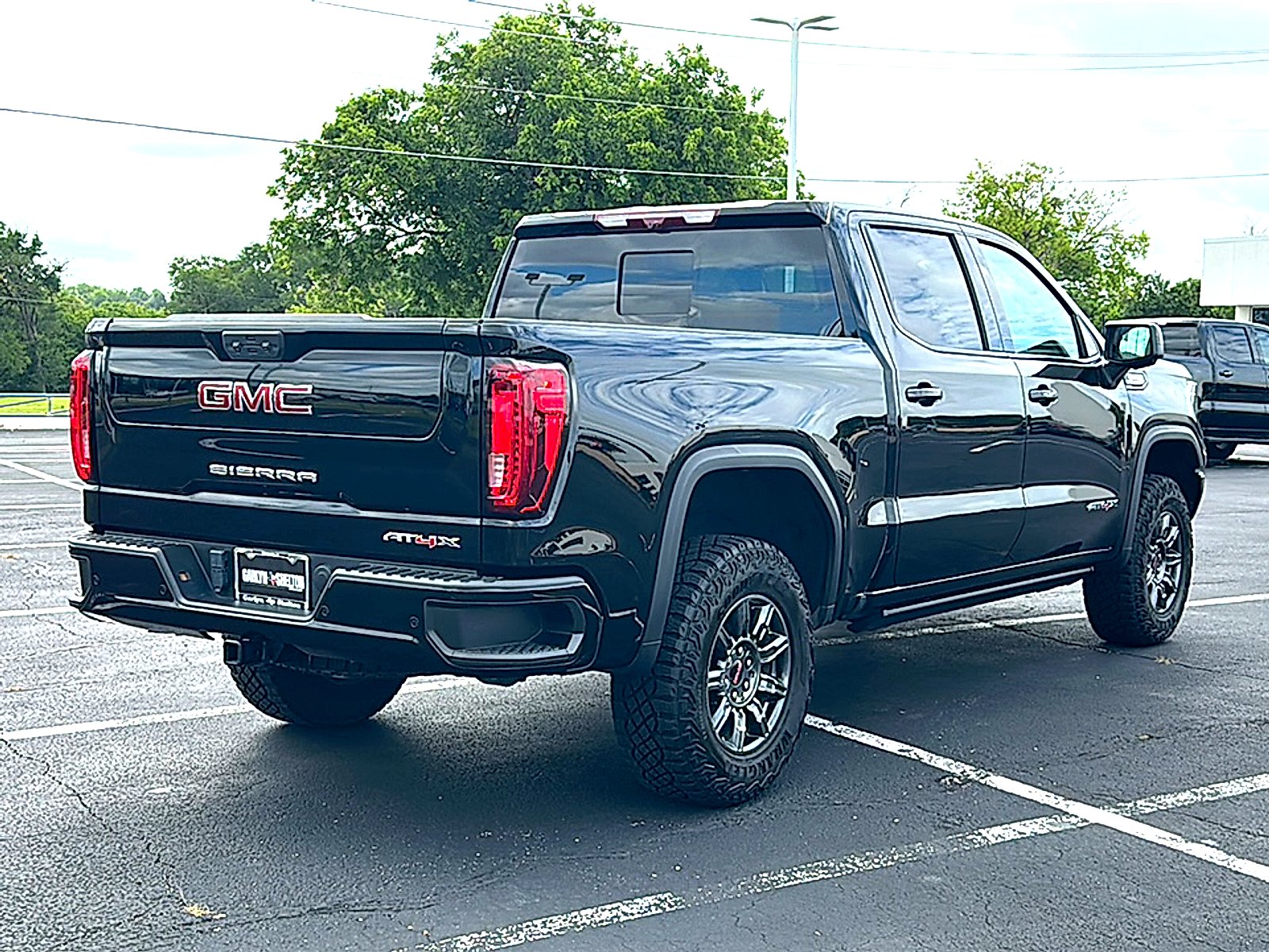 Used 2024 Onyx Black GMC AT4X image 8