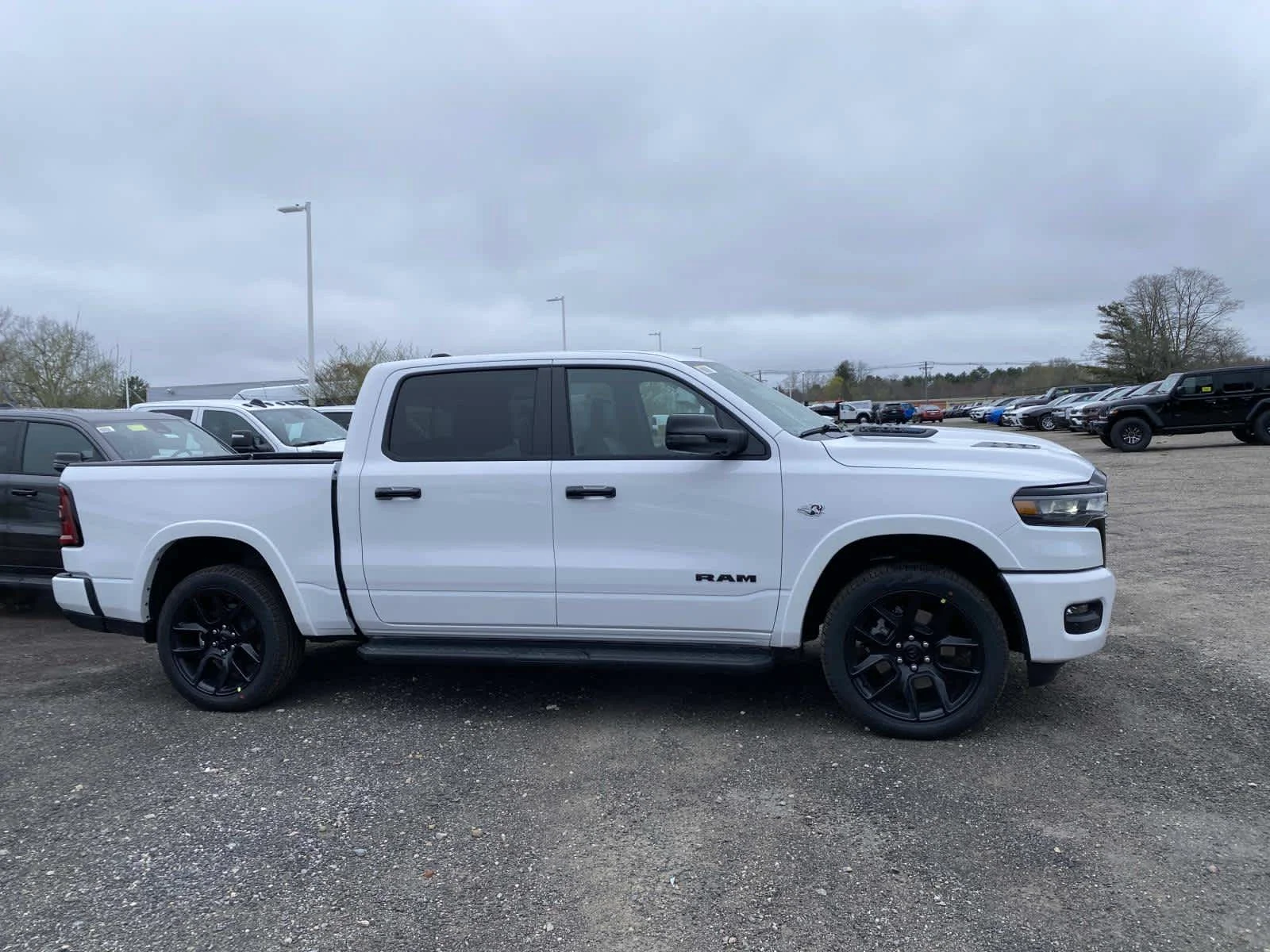 New 2026 Bright White Clear-Coat Exterior Paint RAM Laramie image 2