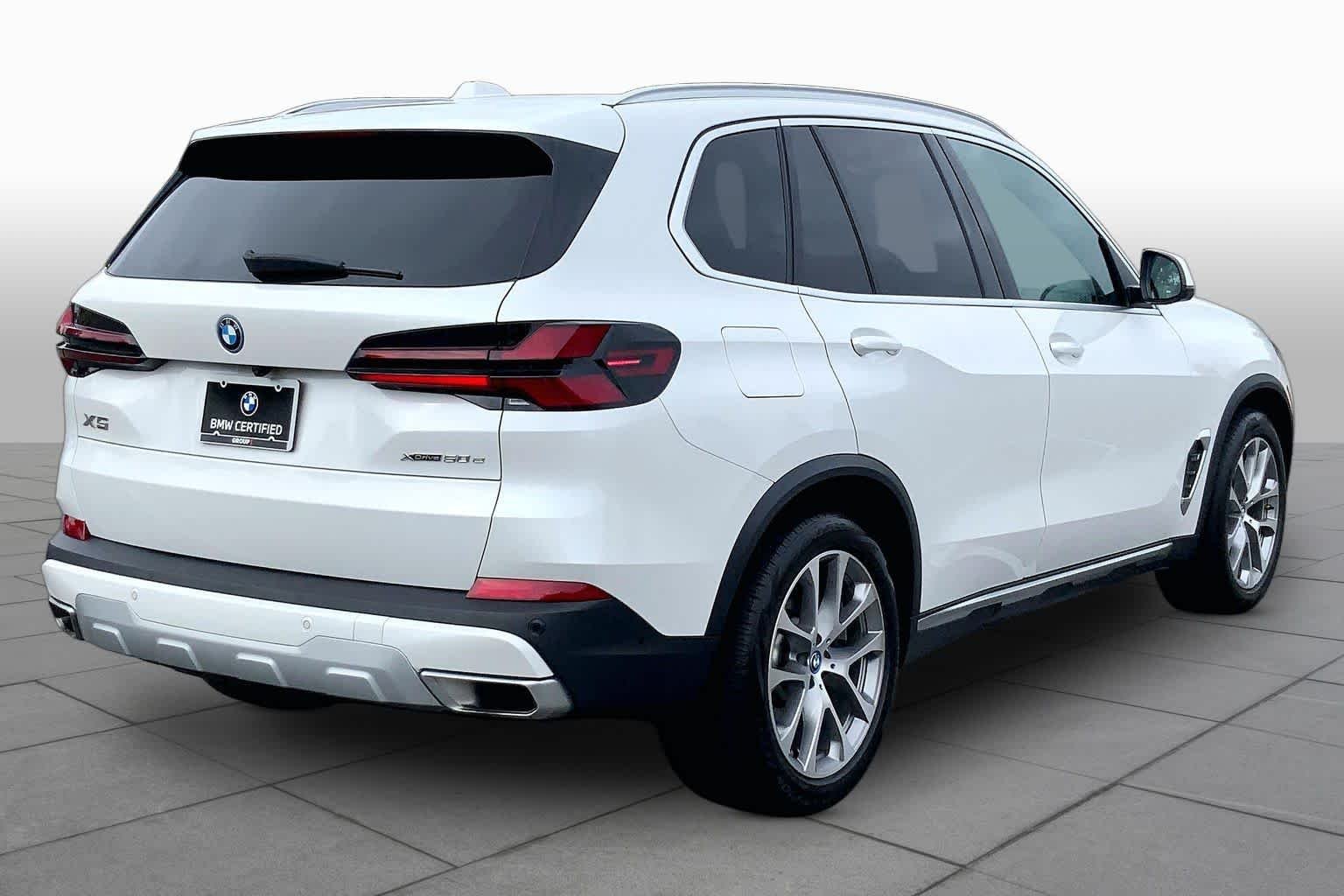 Used 2024 Mineral White Metallic BMW xDrive50e image 12