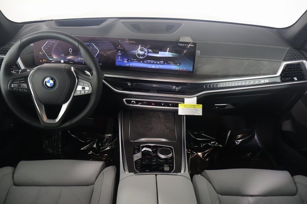 Used 2026 Black Sapphire Metallic BMW xDrive50e image 4