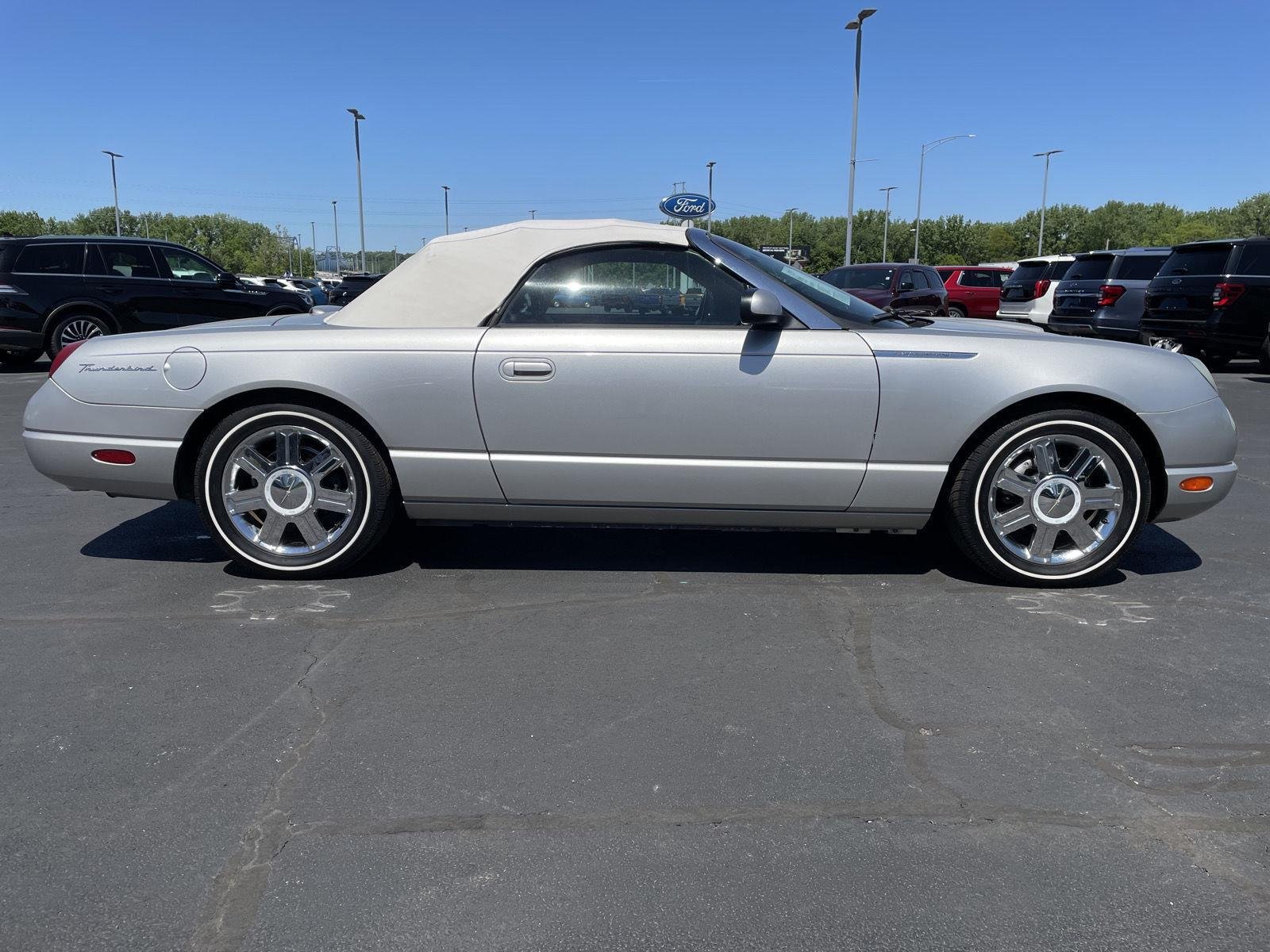 Used 2005 Platinum Silver Ford Deluxe image 6