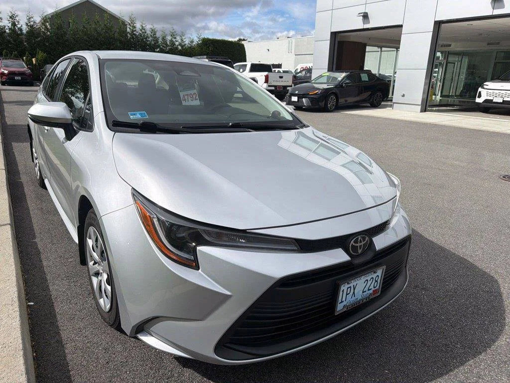 Used 2023 Silver Toyota LE image 1