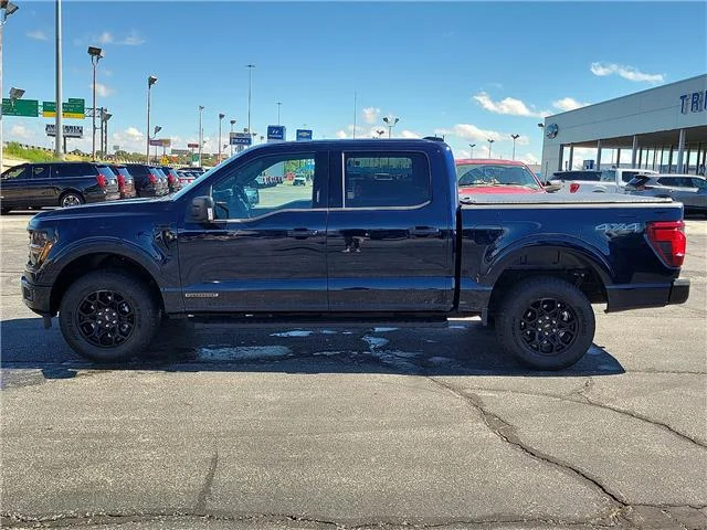 Used 2024 Blue Ford XLT 4x4 SuperCrew Cab 5.5 ft. box 145 in. WB image 2