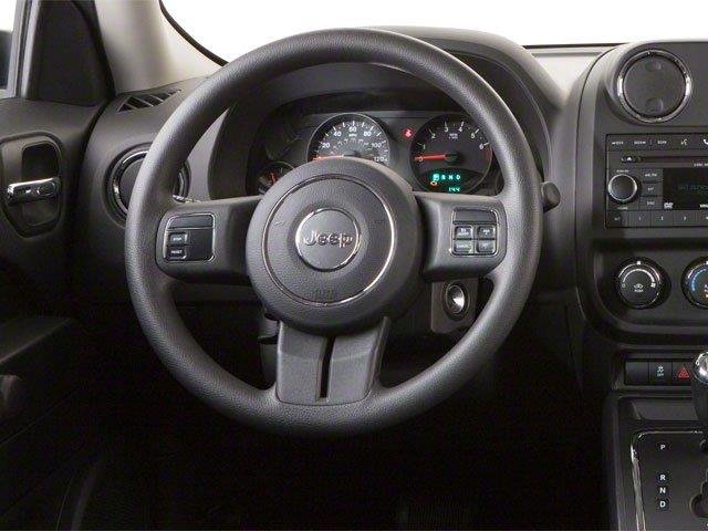 Used 2013 Deep Cherry Red Crystal Pearl Jeep Sport image 2