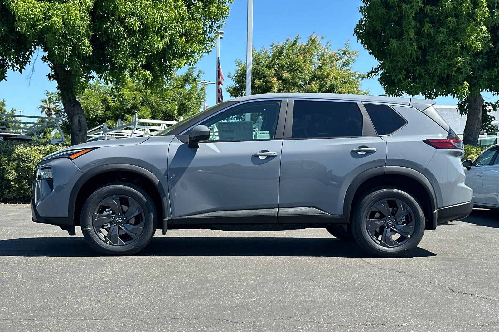 New 2026 Boulder Gray Pearl Nissan SV image 7