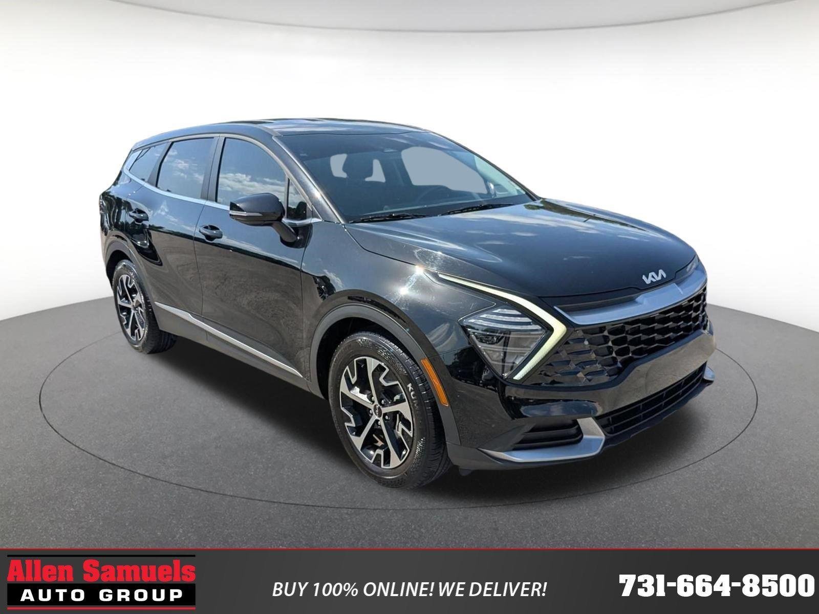 Used 2024 Ebony Black Kia EX image 1