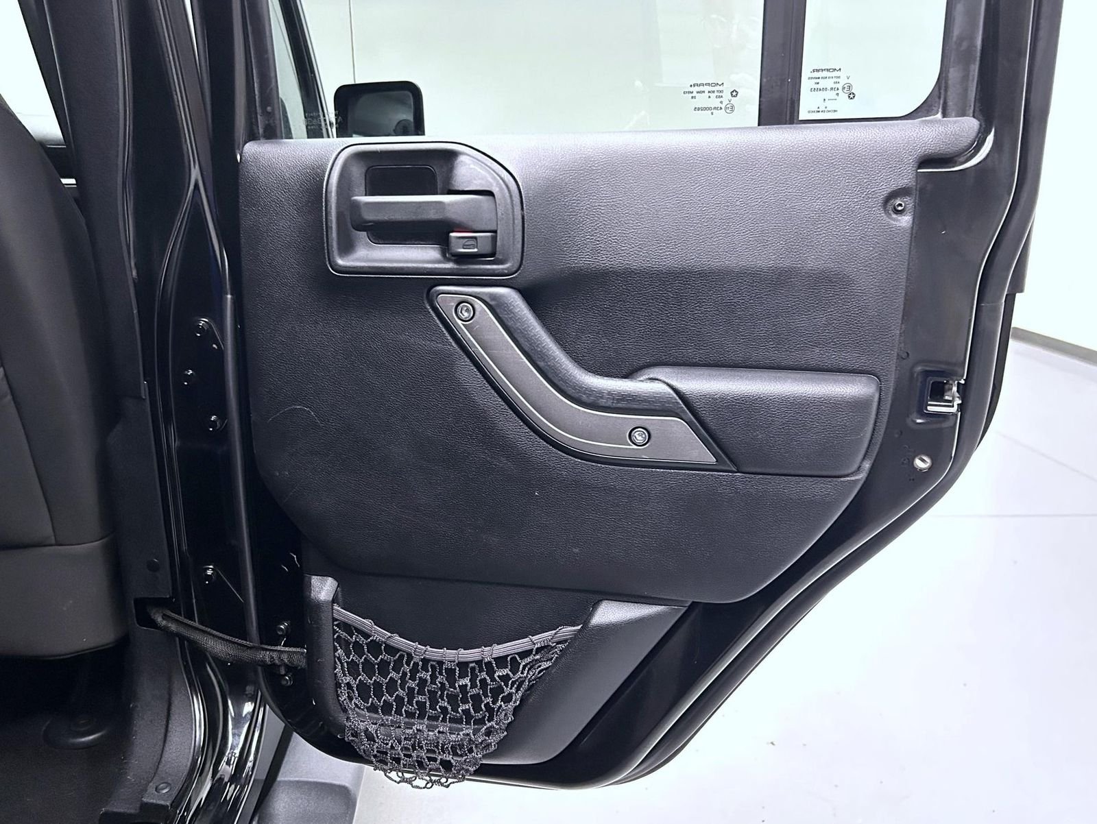 Used 2014 Black Jeep Unlimited Sport image 17