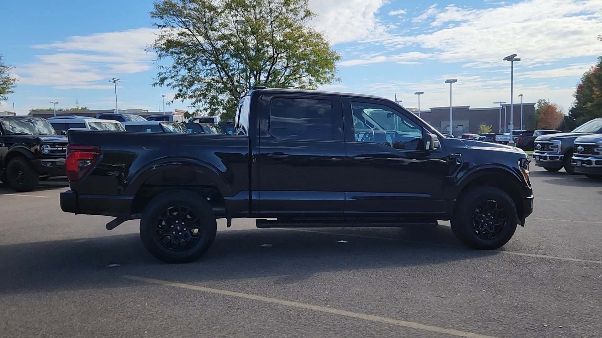 Certified Used 2024 Agate Black Metallic Ford XLT image 11