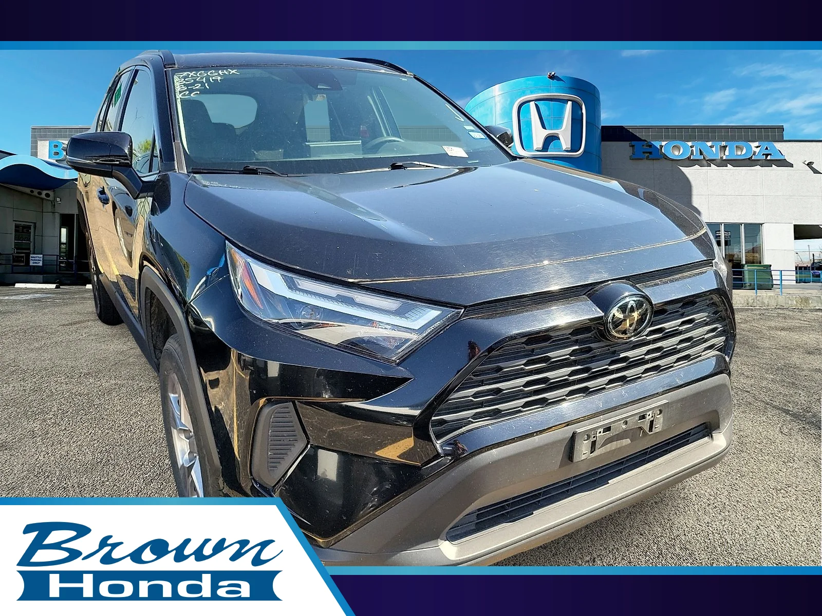 Certified Used 2025 Midnight Black Metallic Toyota XLE image 1