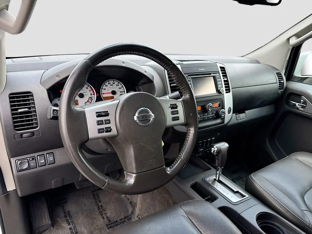 Used 2013 Glacier White Nissan PRO-4X image 9