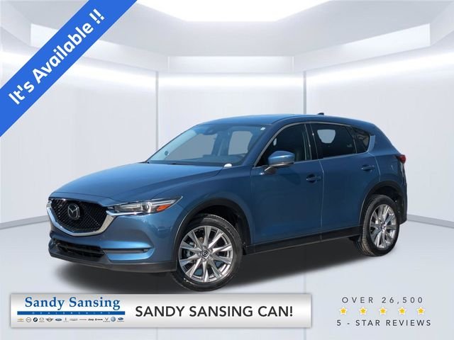 Used 2021 Blue Mazda Grand Touring image 1