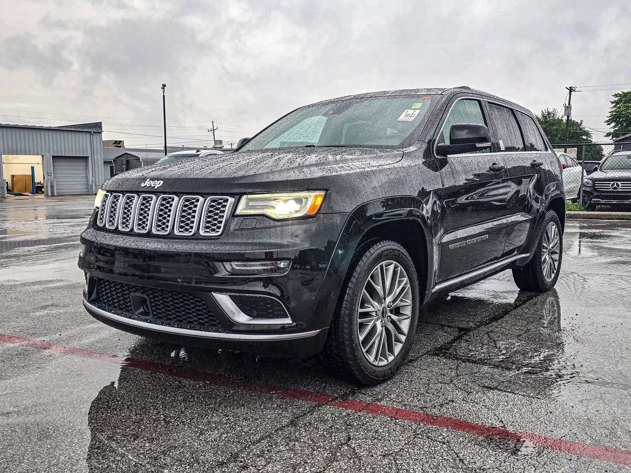 Used 2017 Black Jeep Summit 4x4 image 2