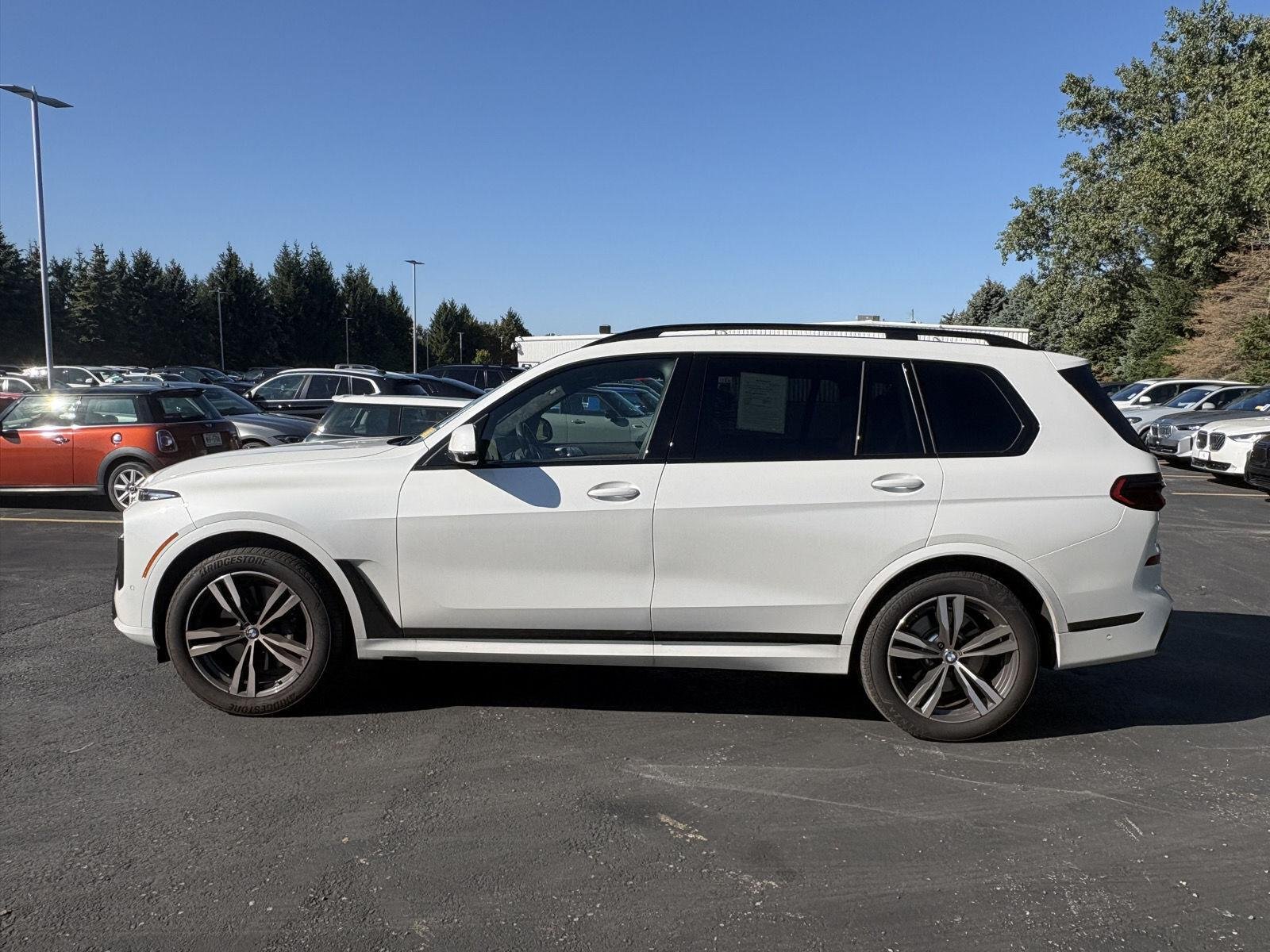 Used 2026 Mineral White Metallic BMW xDrive40i image 4